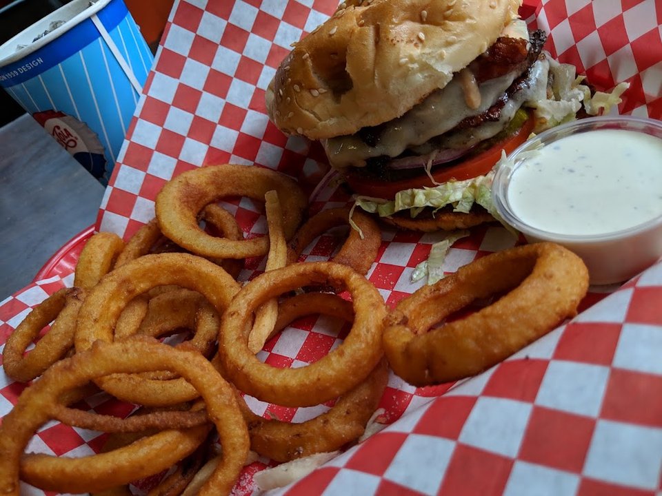 Restaurant menu with kids' choices and salads.